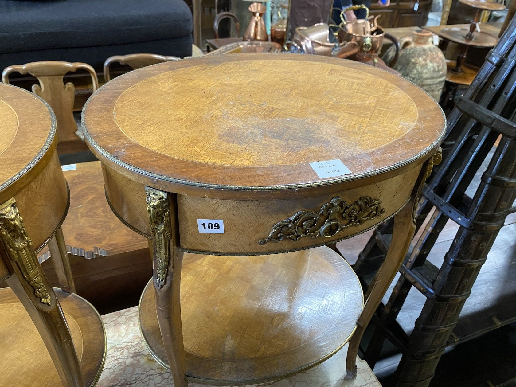 A pair of Louis XV style ormolu mounted banded walnut two tier side tables, width 54cm, depth 41cm, height 68cm